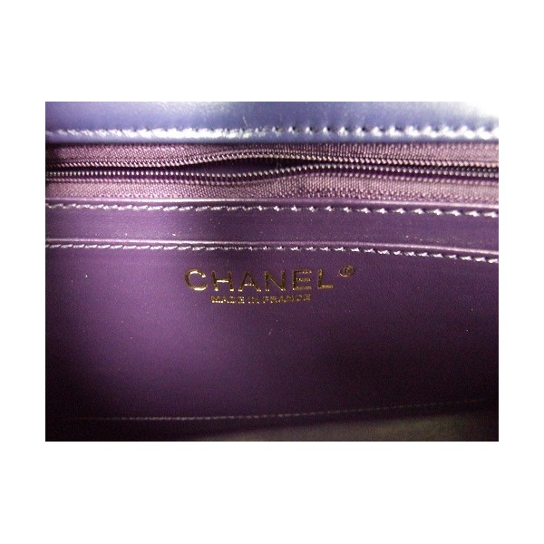 Chanel Flap Bag In Pelle A49312 Viola Con La Testa Di Leone Clas