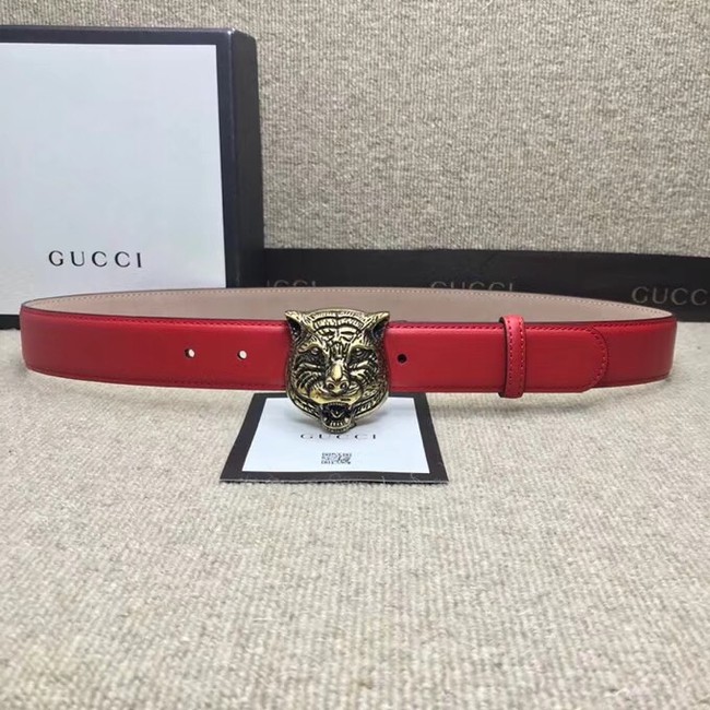 Gucci Leather belt with feline buckle 409420 red