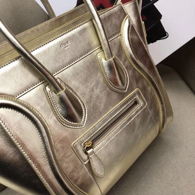 CELINE MICRO LUGGAGE HANDBAG IN LAMINATED LAMBSKIN 189793 GOLD