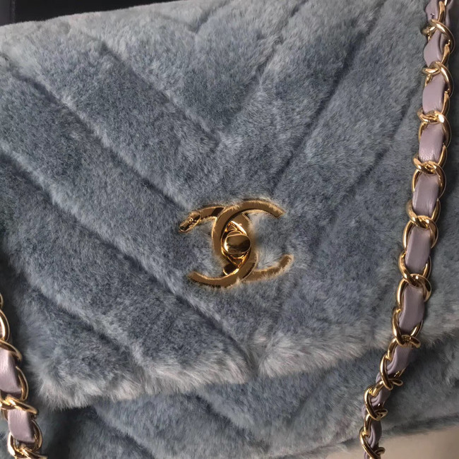 Chanel flap bag with top handle A92991 light blue