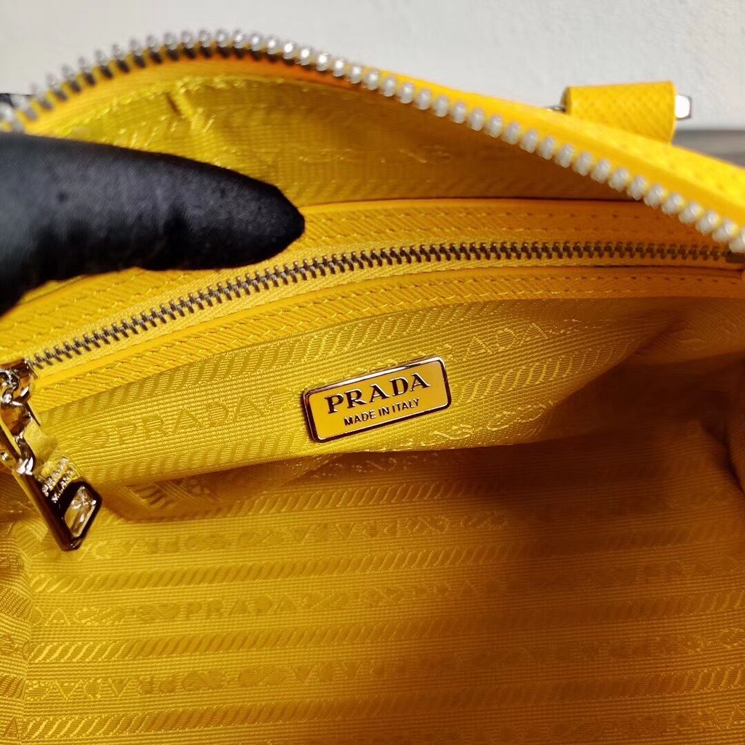 Prada Re-Edition 2005 top-handle bag 1BB846 yellow