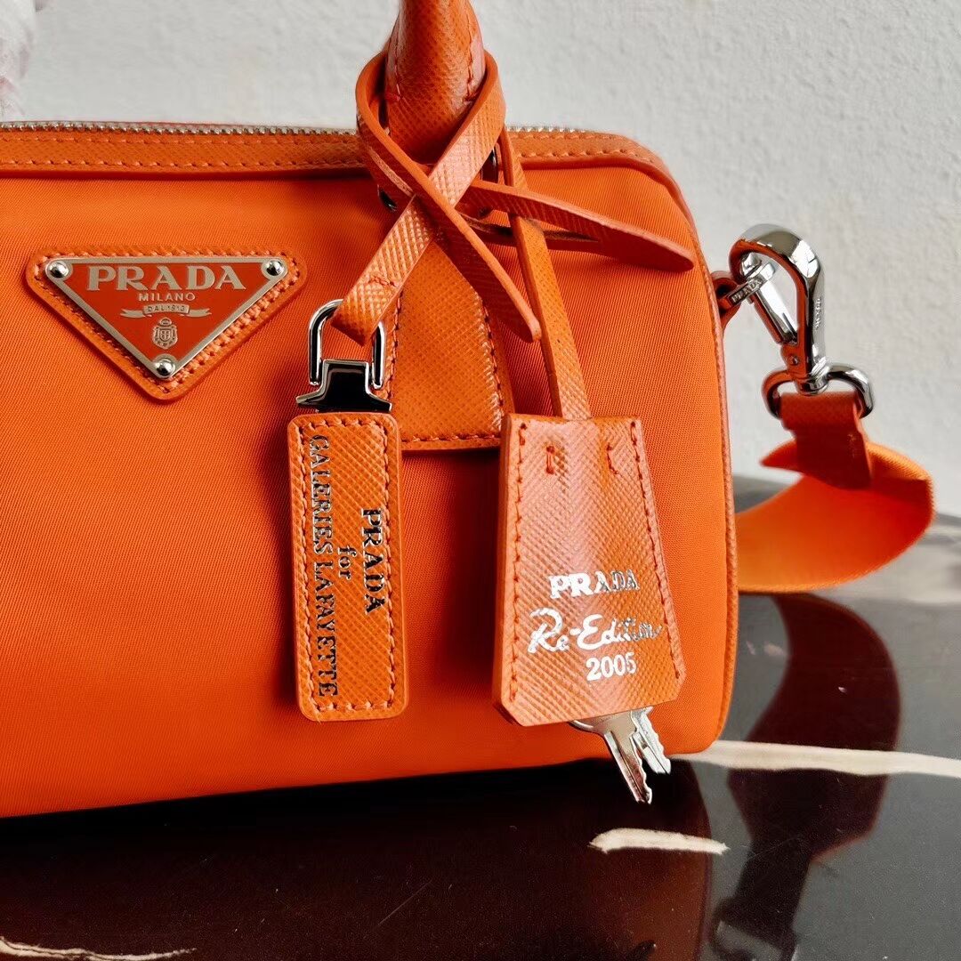 Prada Re-Edition 2005 top-handle bag 1PR846 orange