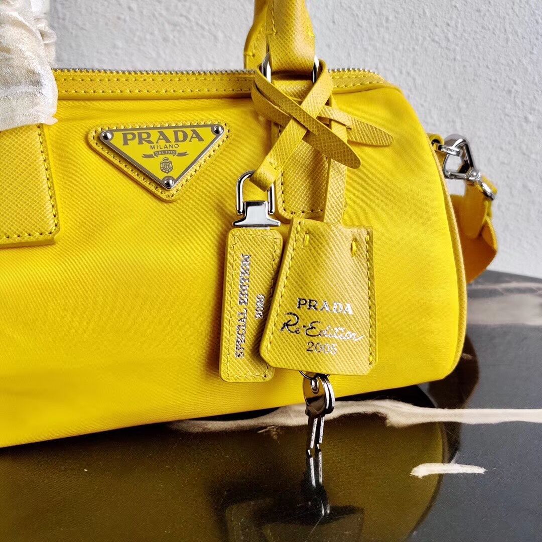 Prada Re-Edition 2005 top-handle bag 1PR846 yellow