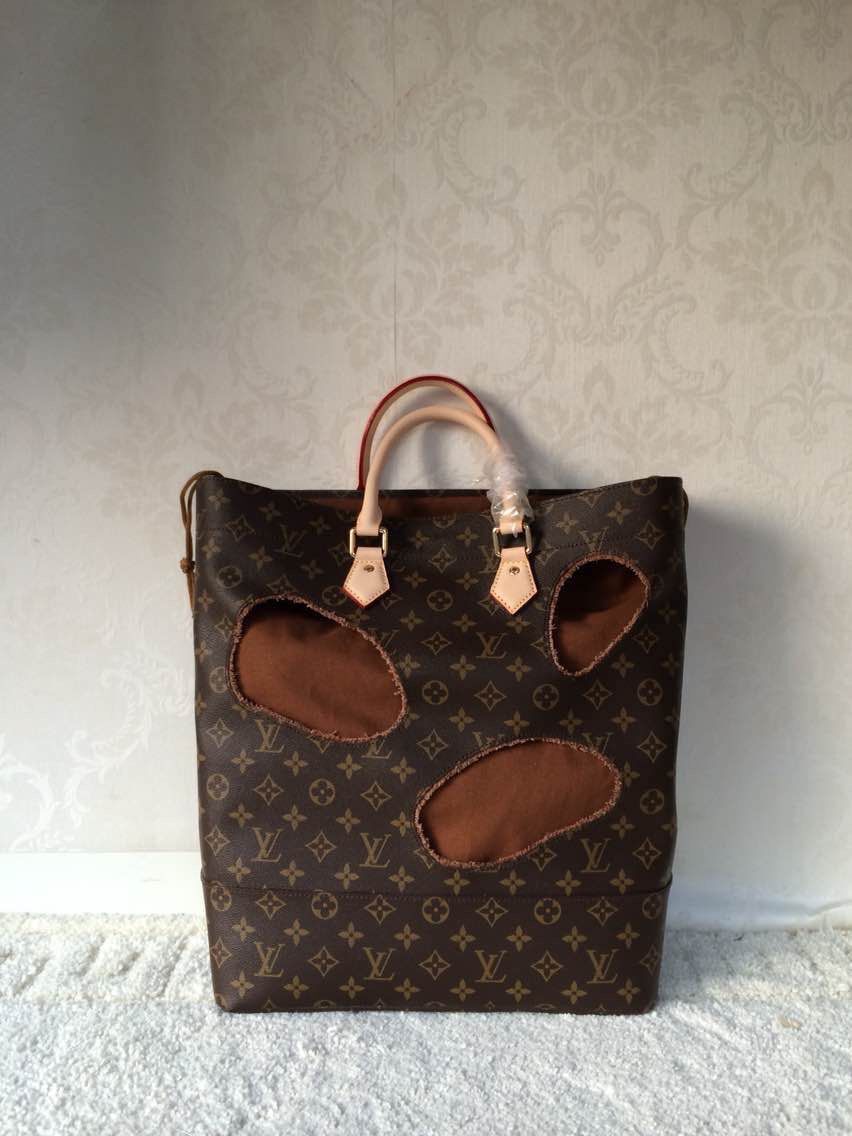 Louis Vuitton Original Leather Monogram canvas BAG WITH HOLES REI KAWAKUBO M40279