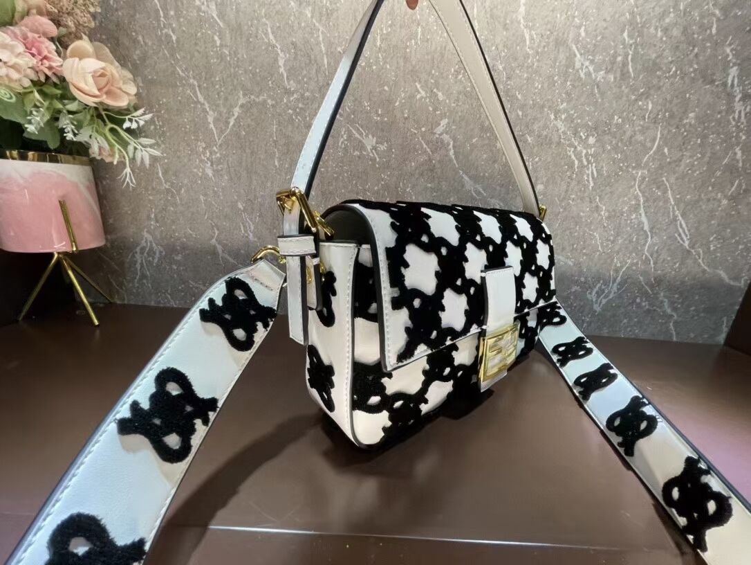 Fendi BAGUETTE Black and white braided leather bag 8BR600A