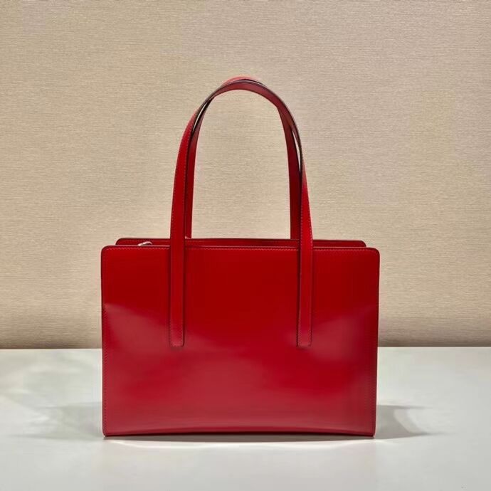 Prada Re-Edition 1995 brushed-leather medium handbag 1BA350 red