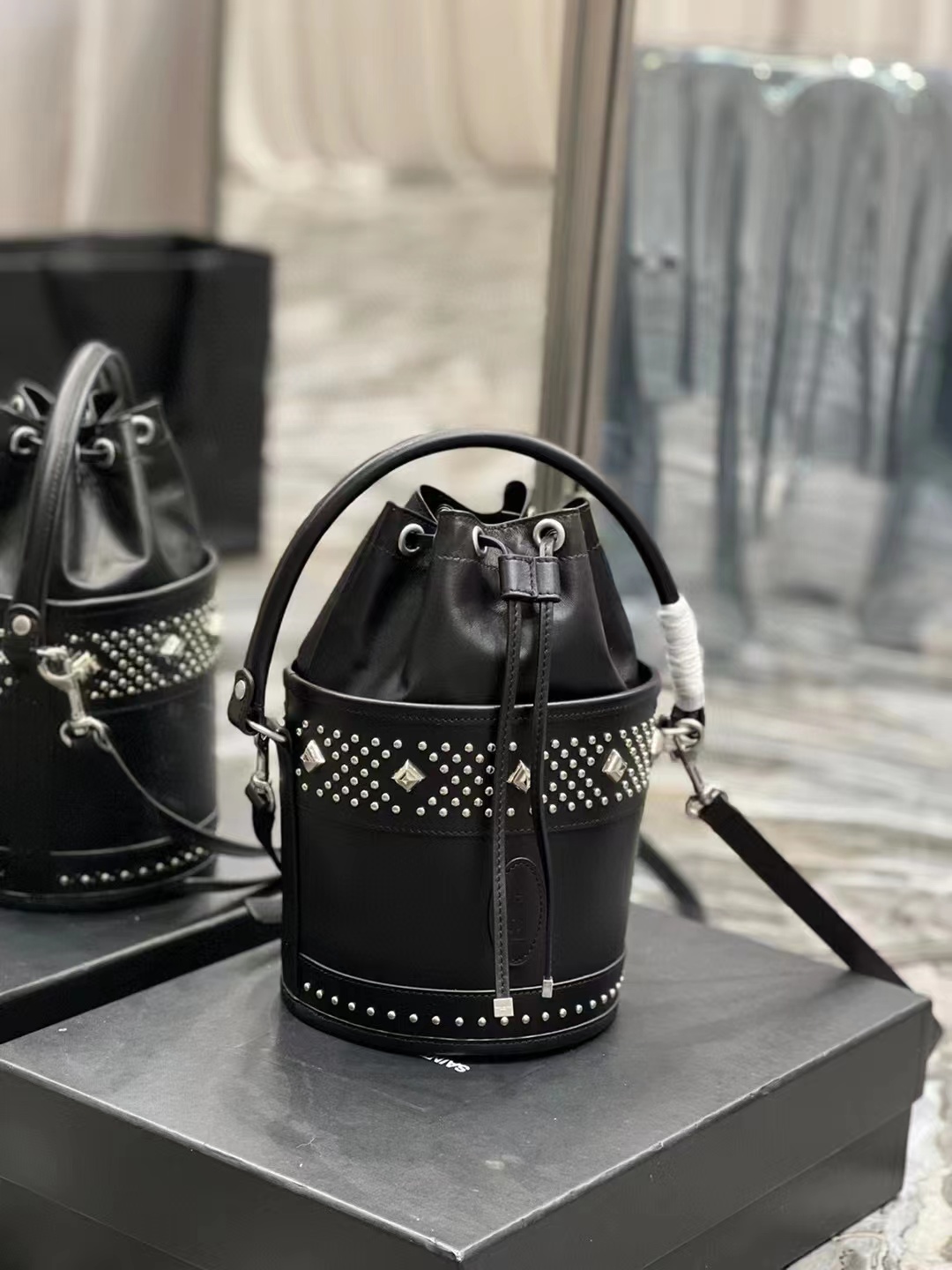 SAINT LAURENT LE MAILLON HOOK BUCKET BAG IN SUPPLE LEATHER Y696333 black 