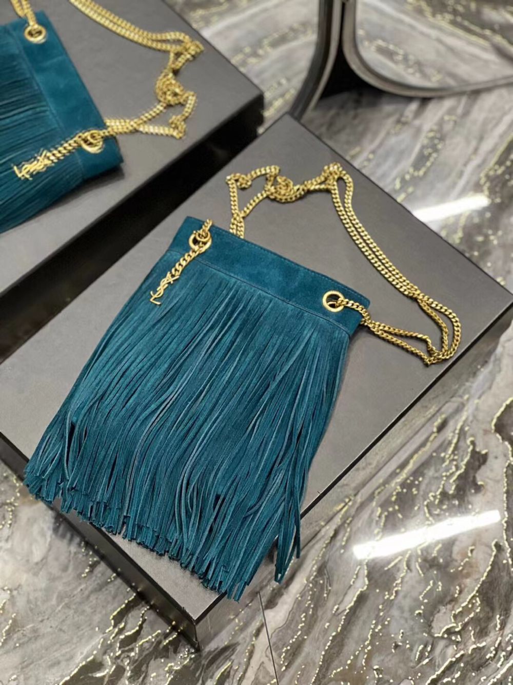 SAINT LAURENT SMALL CHAIN BAG IN LIGHT SUEDE WITH FRINGES 683378 blue