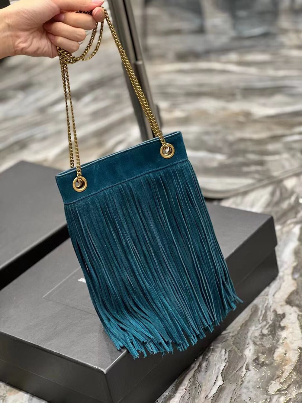 SAINT LAURENT SMALL CHAIN BAG IN LIGHT SUEDE WITH FRINGES 683378 blue