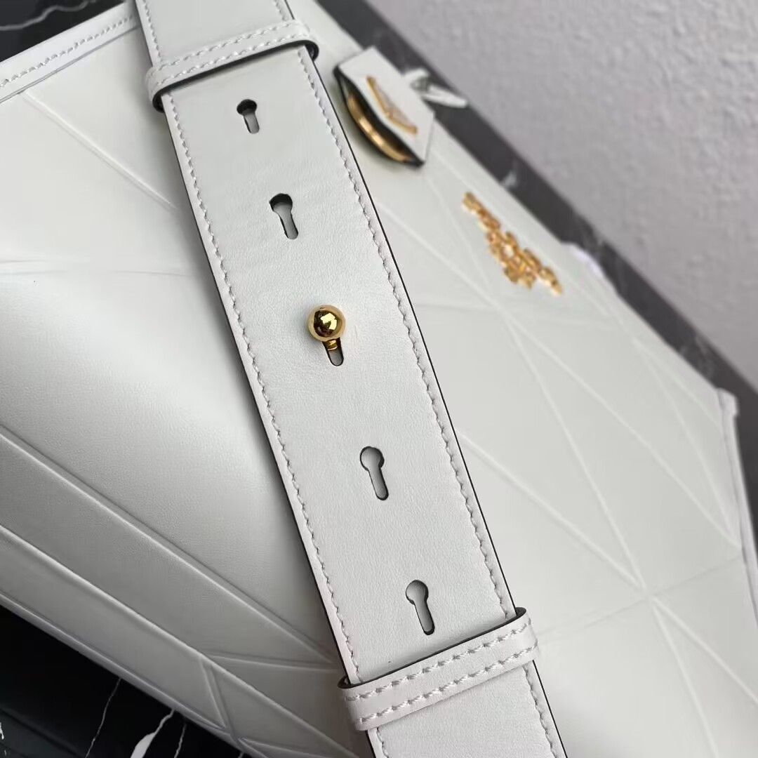 Small leather Prada Symbole bag with topstitching 1HH039 white