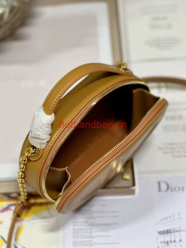 CD SIGNATURE OVAL CAMERA BAG Golden Saddle Calfskin with Embossed CD Signature S2201UMFV