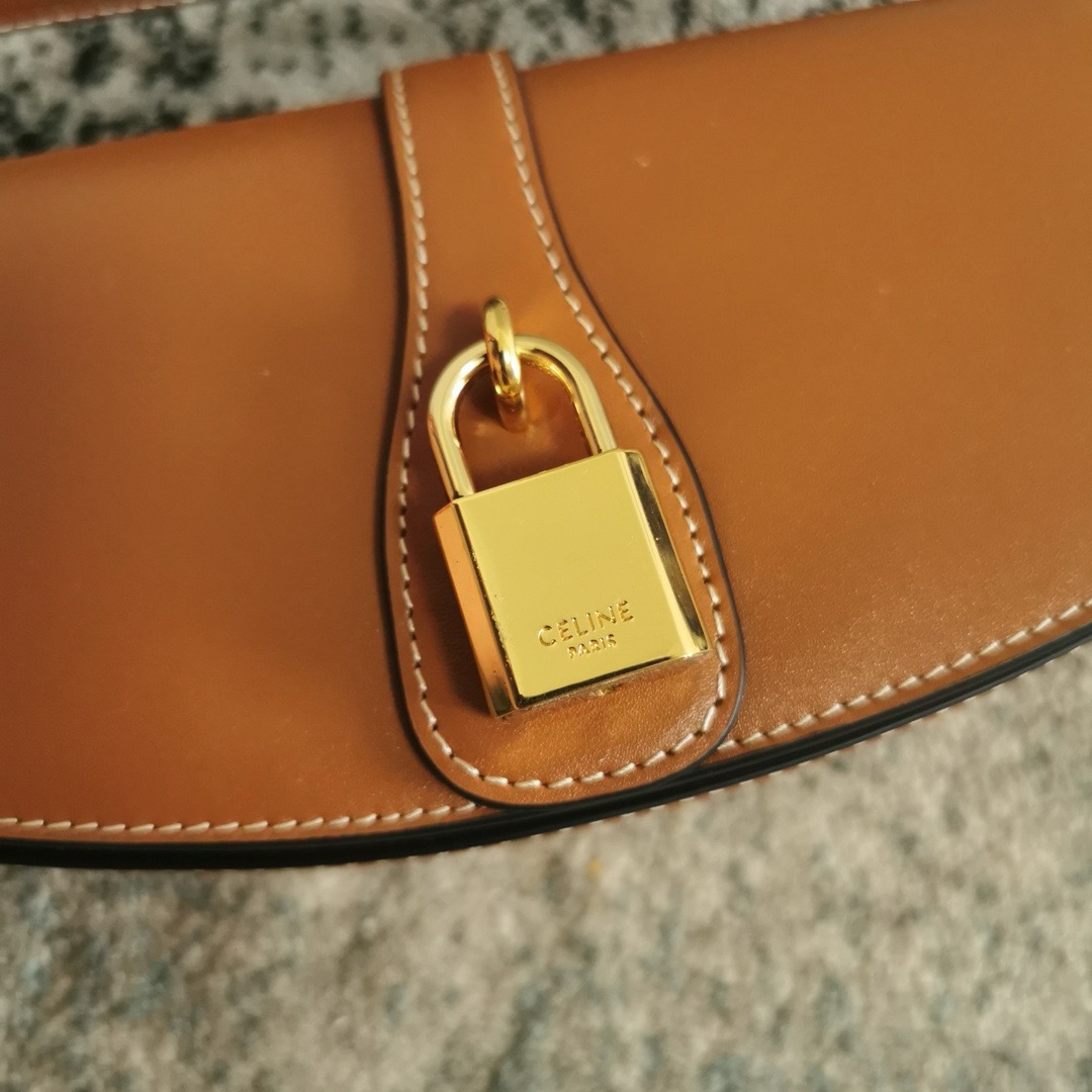 CELINE CLUTCH ON STRAP TABOU IN SUPPLE CALFSKIN 101592 TAN