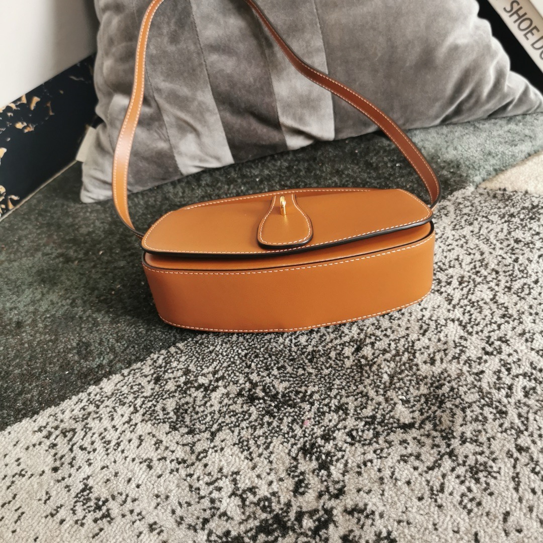 CELINE CLUTCH ON STRAP TABOU IN SUPPLE CALFSKIN 101592 TAN