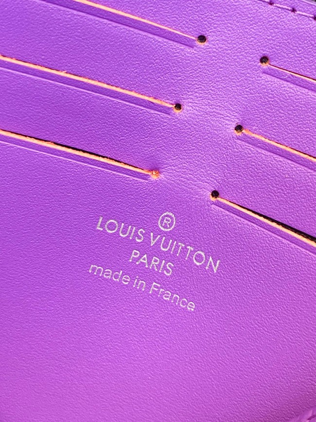 Louis Vuitton Pochette Voyage Monogram embossed cowhide leather MM M61692 Purple